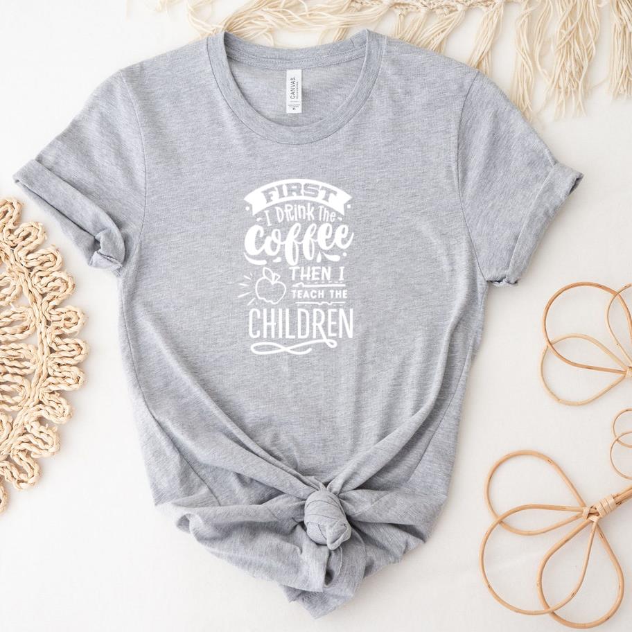 First I drink the coffee then I teach  white T-Shirt